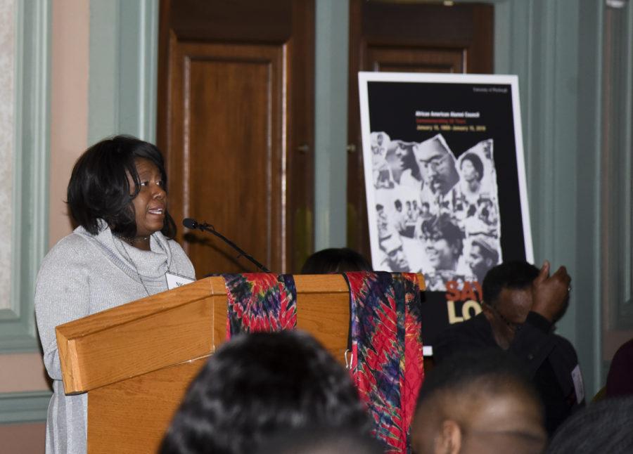 Nicole E. W. Parks, African American Alumni Council President, welcomes guests at “Say It Loud.” 