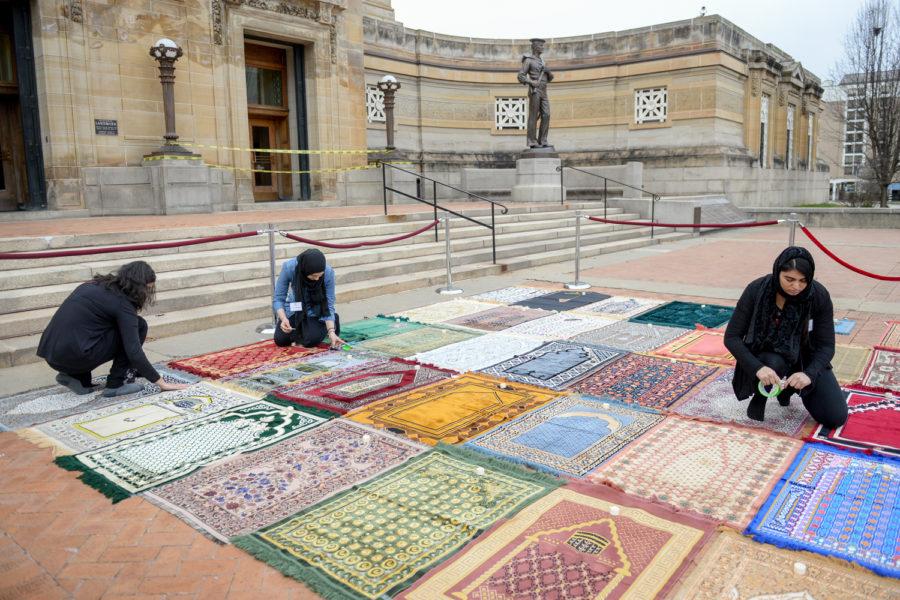 Prayer rugs laid out at Sunday evening’s “Rehumanize: A Vigil for Muslims in New Zealand” memorial. 
