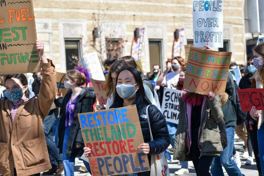 More than 200 protesters marched through Oakland on Friday afternoon during a climate strike rally, urging climate justice and fossil fuel divestment. Organized by Sunrise Movement Pittsburgh, the protest started on Flagstaff Hill before protesters walked to the Cathedral of Learning.