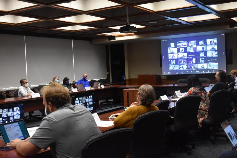 Pitt Faculty Assembly members discuss criteria used to assess professors’ scholarly pursuits on Wednesday. Members voted in favor of a dependent care committee and an academic freedom resolution.