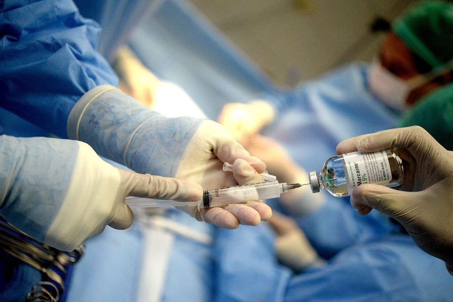 Inside of an operating room during a surgery. 
