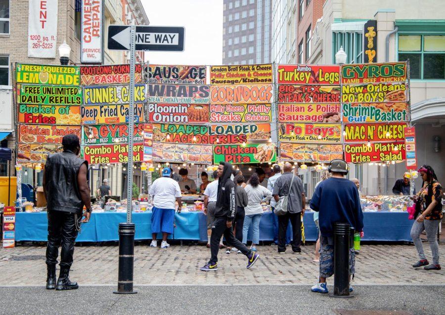 People line up for food at A Soulful Taste of the Burgh, an annual soul food and music festival, in Market Square on Saturday.