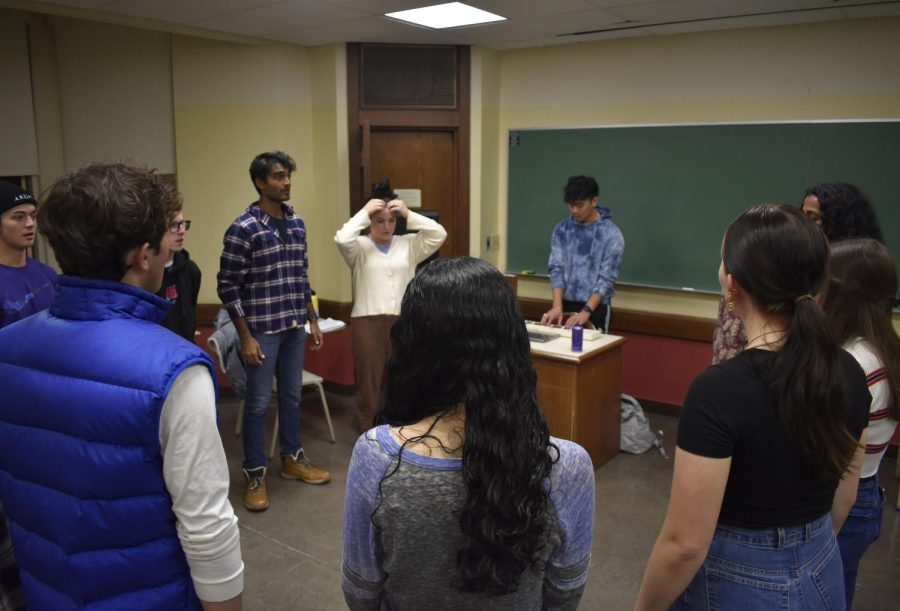 A cappella club Tonal Disruptions practices in the Cathedral of Learning on Thursday night. 
