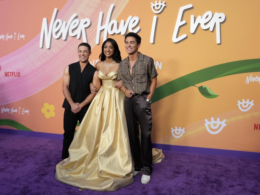 Jaren Lewison, Maitreyi Ramakrishnan and Darren Barnet, from left, cast members in "Never Have I Ever," pose together at the Season Four premiere of the Netflix series Thursday, June 1, 2023, at Regency Village Theatre in Los Angeles.