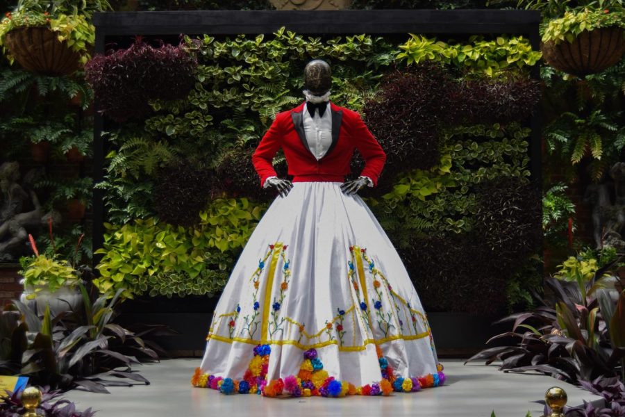 A Pittsburgh-inspired gown on display at the entrance of the  “Flowers Meet Fashion: Inspired by Billy Porter" exhibit at Phipps Conservatory. 