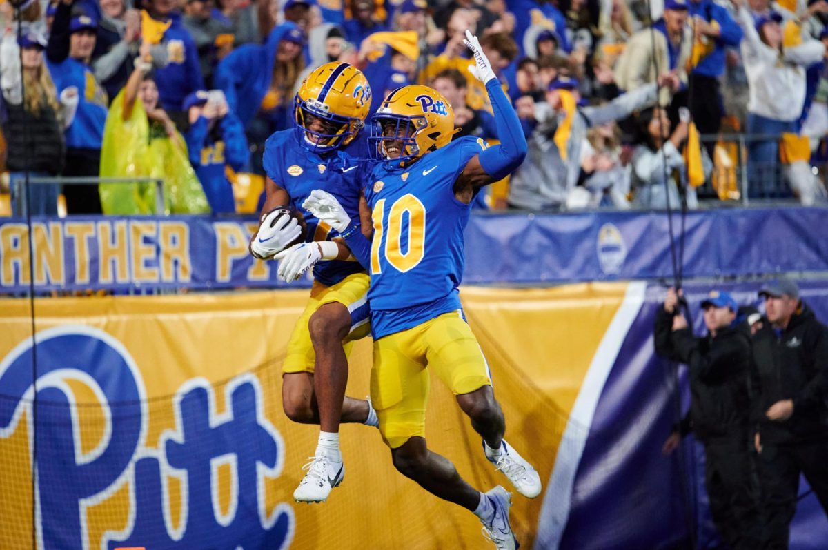 Redshirt freshman defensive back Ryland Gandy (10) celebrates in the end zone with a teammate during Saturday night's game against UNC at Acrisure Stadium. 