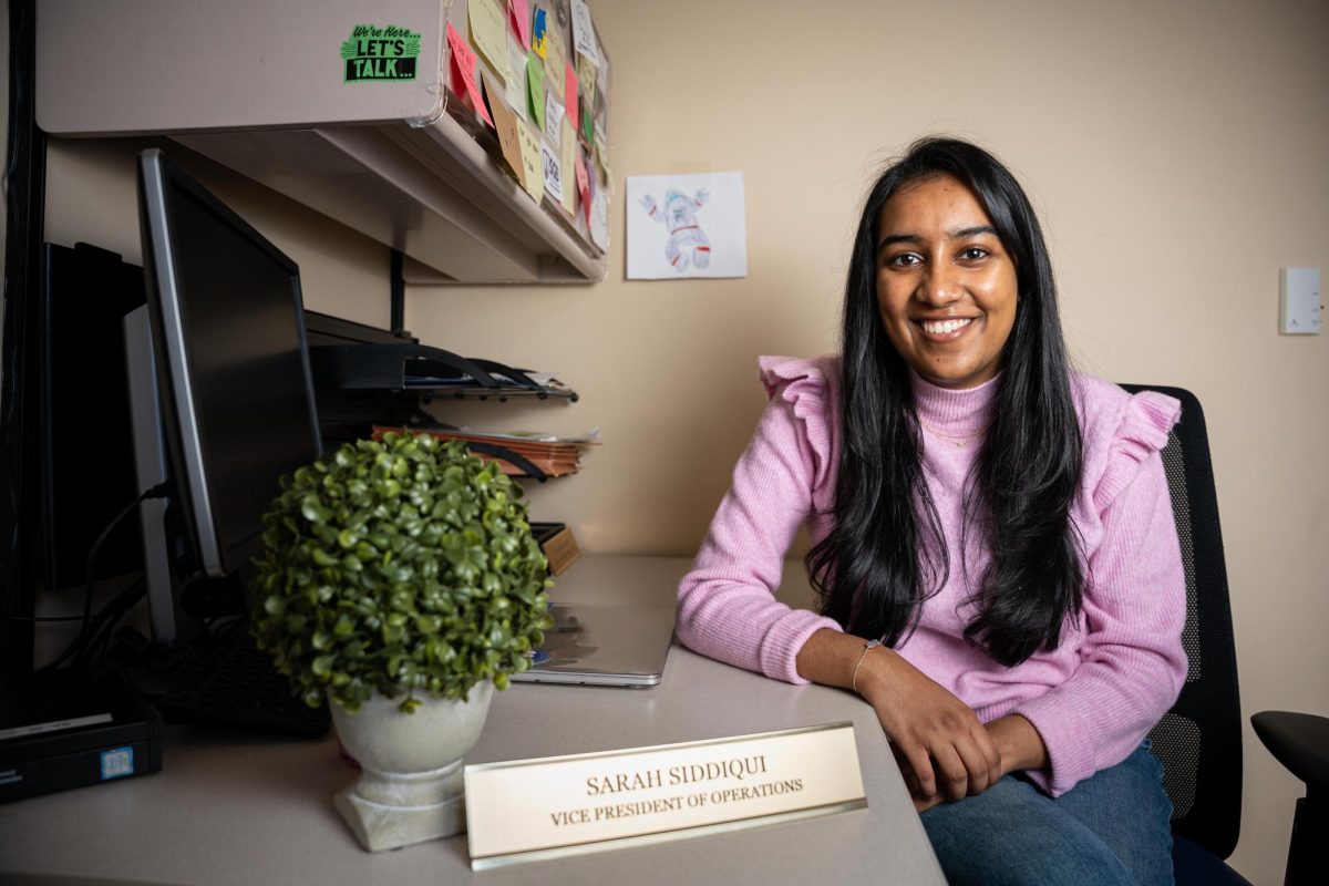 Sarah Siddiqui poses for a photo in her office.