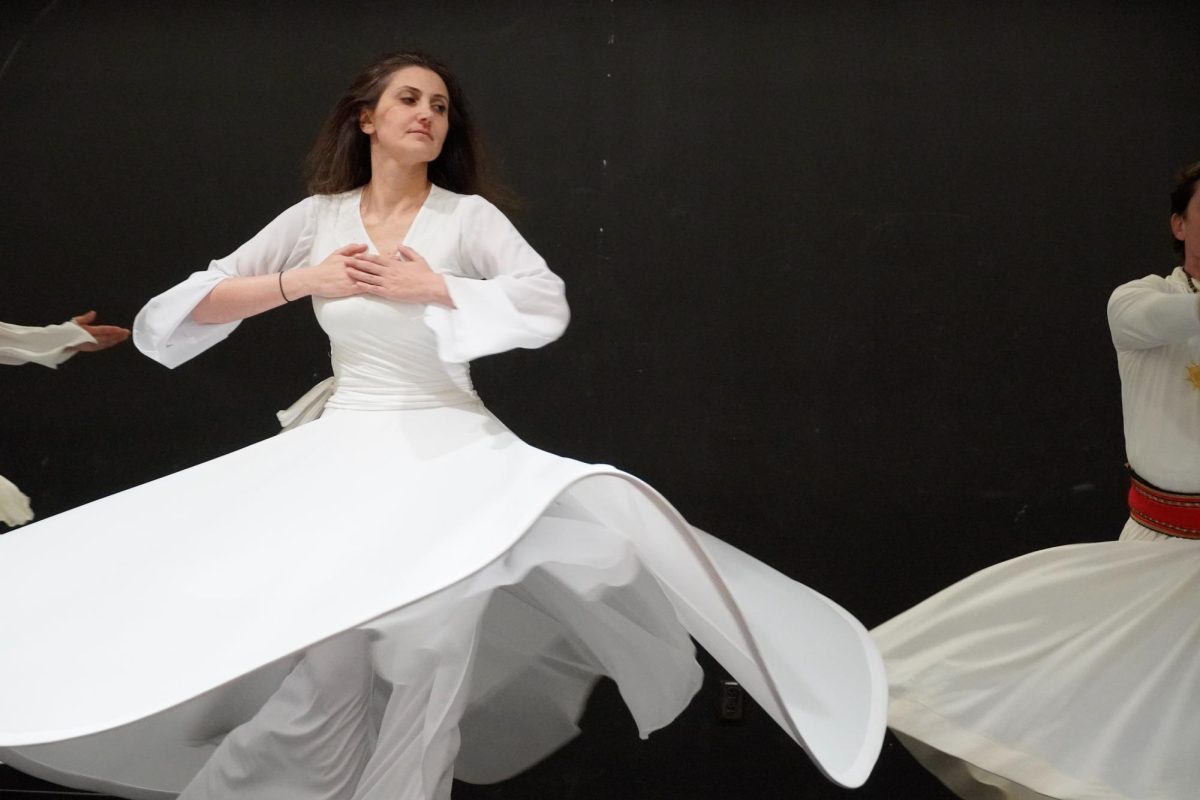 A Sufi whirler performs during Fann Club’s Sufi Whirling Night on Saturday evening in the William Pitt Union.