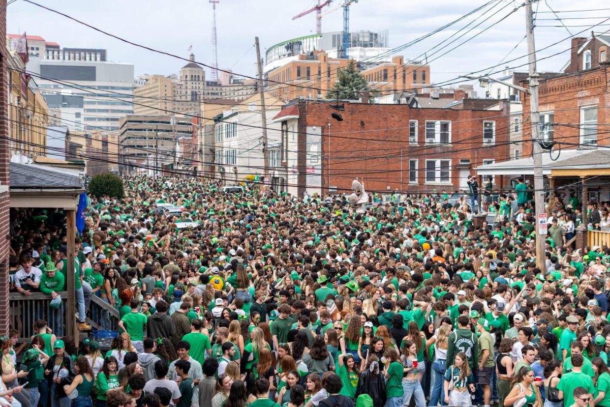 Students flood Semple Street for the Ginger Run on Saturday, Mar. 15.
