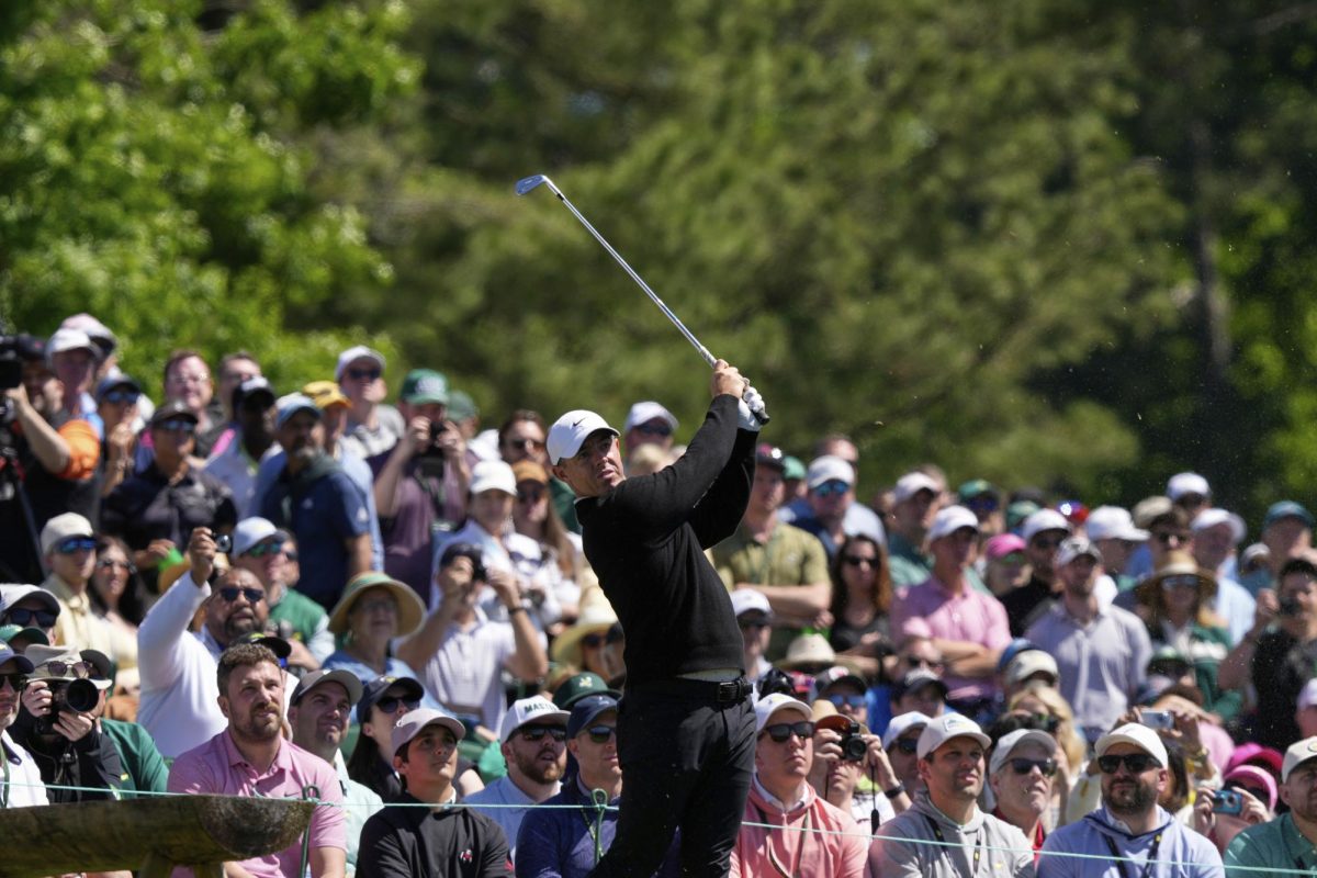 Rory McIlroy, of Northern Ireland, hits from the 12th tee during a practice round at the Masters golf tournament, Tuesday, April 8, 2025, in Augusta, Ga.
